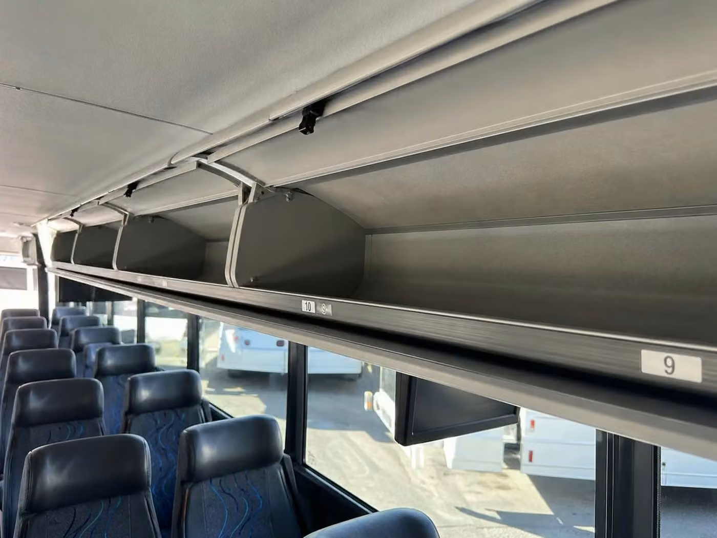 santa paula 28 passenger minibus overhead storage